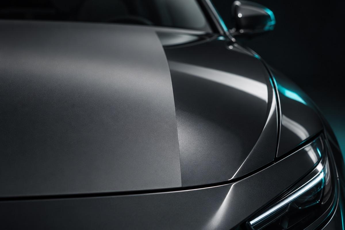 Matte film on a hood edge, satin sheen
