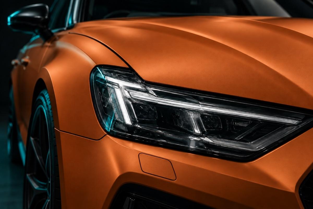 Sunset Orange colour film on a fender next to a clear-filmed headlamp